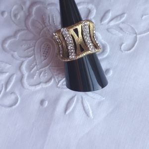 Textured gold tone and rhinestone bamboo Roman number curved ring